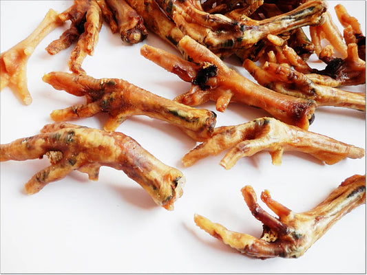 Chicken feet natural dog chew from K9 Prime Cuts – 100% chicken, air-dried, rich in collagen, glucosamine & chondroitin; promotes joint, skin and dental health.
