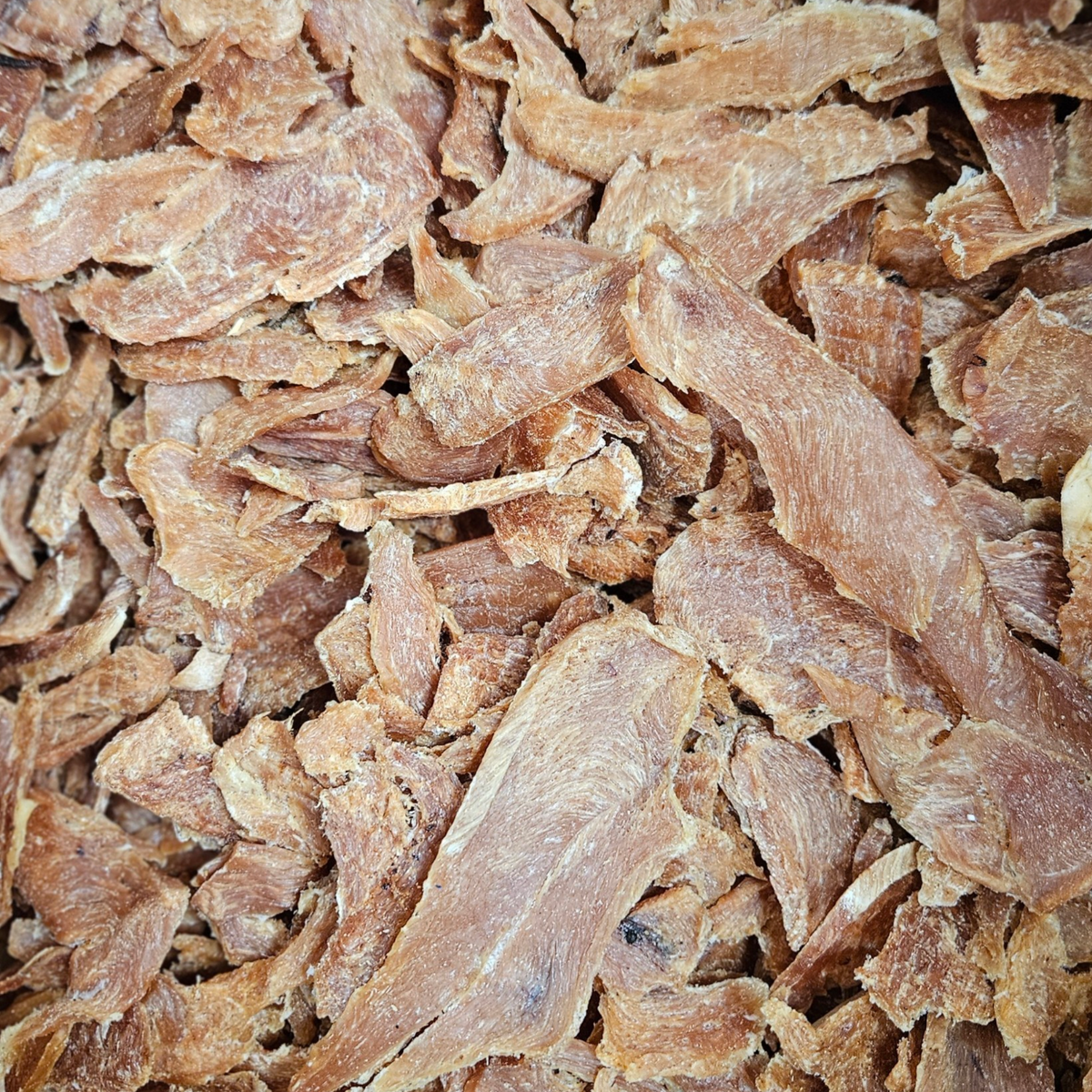 An array of slicedand dehydrated chicken breast used for dog treats and sold by k9 prime cuts ltd Basingstoke